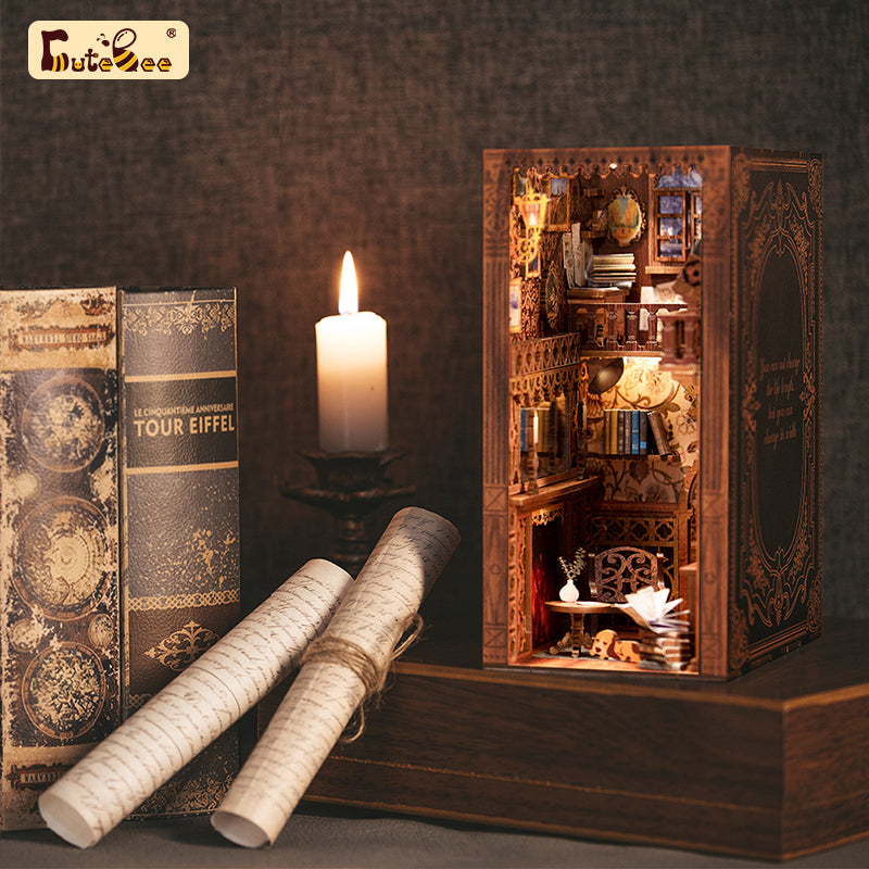 Eternal Bookstore beside books and a candle
