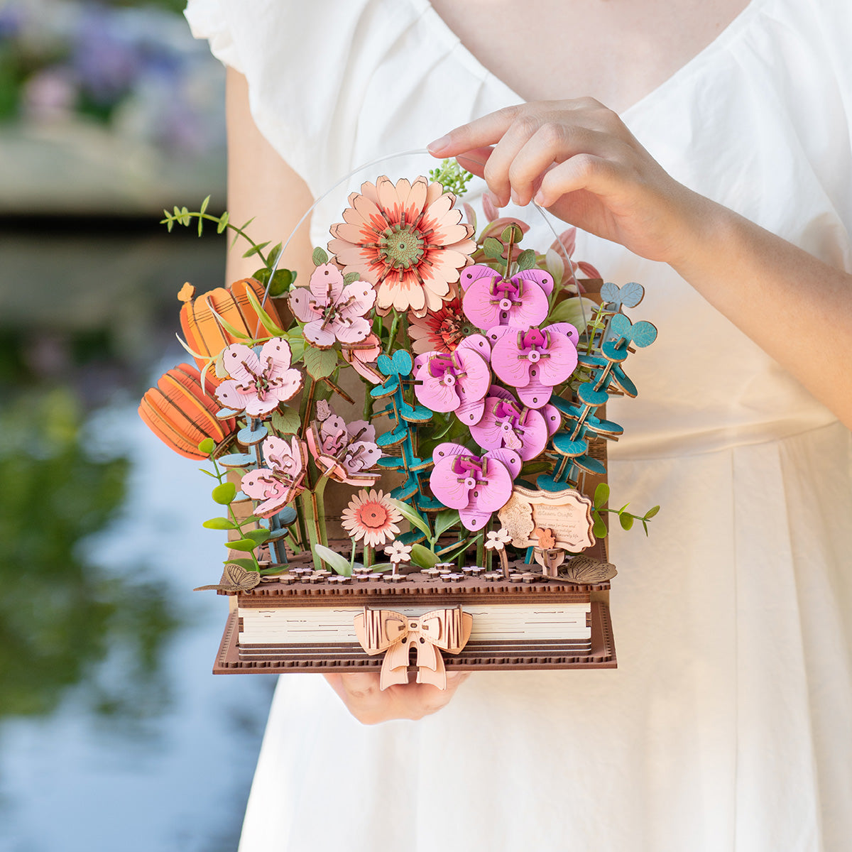 Wooden Blooming Book held for scale