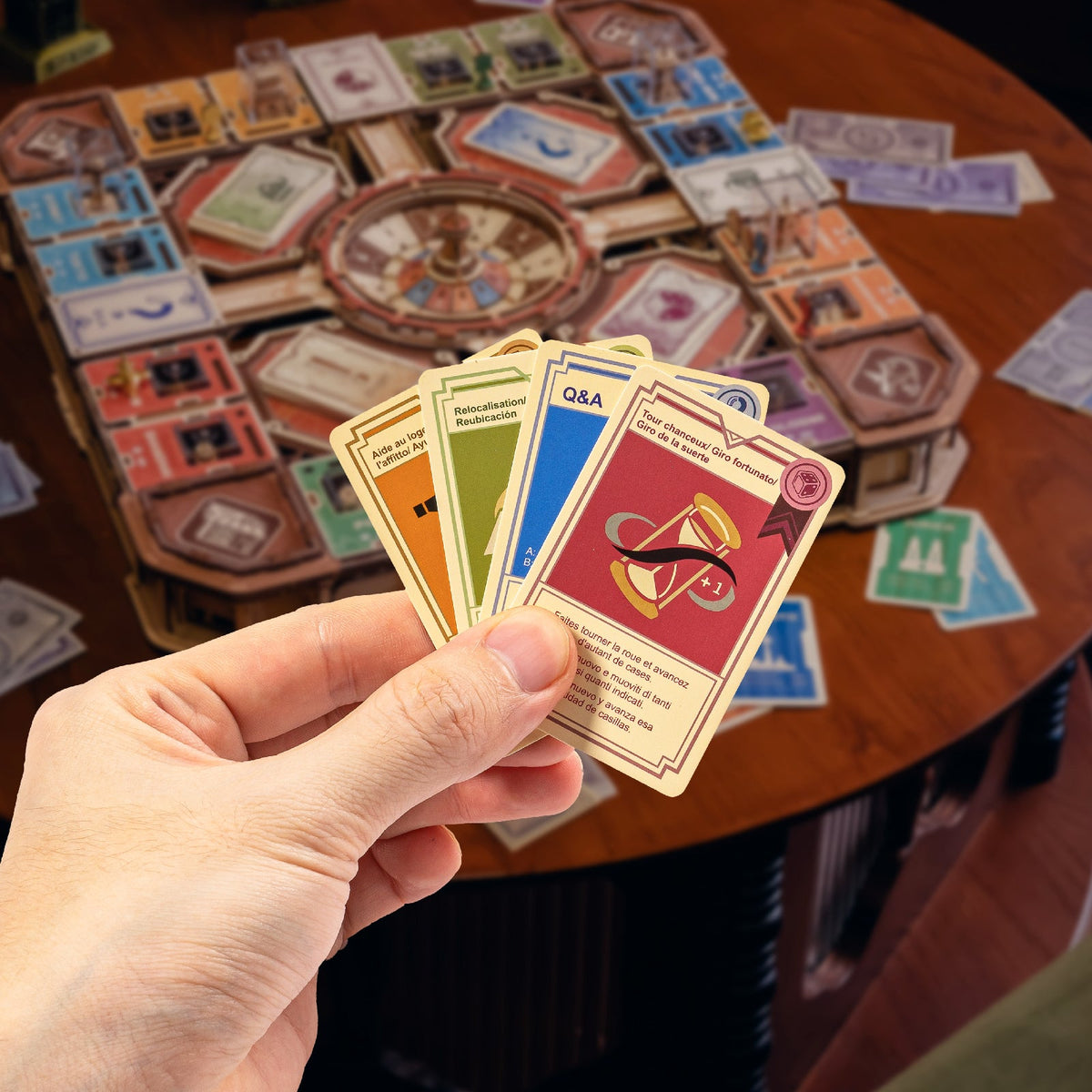 Fortune Quest cards held beside the game