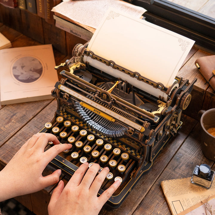 ROKR typewriter being used on a desk